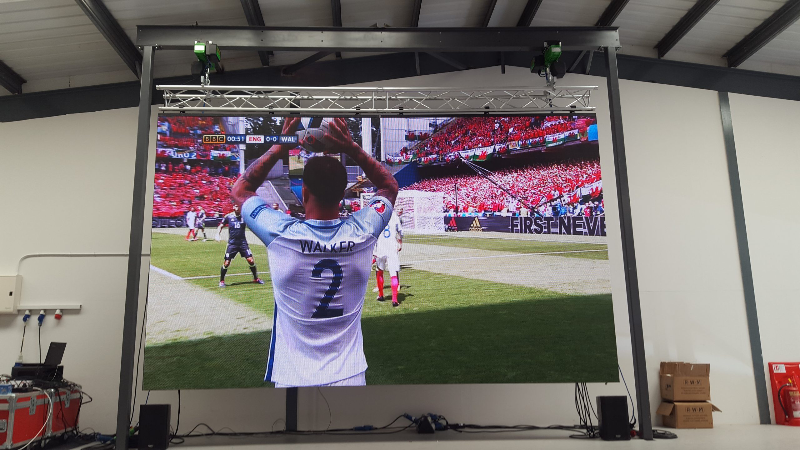 Watching England on our LED screen with our neighbours